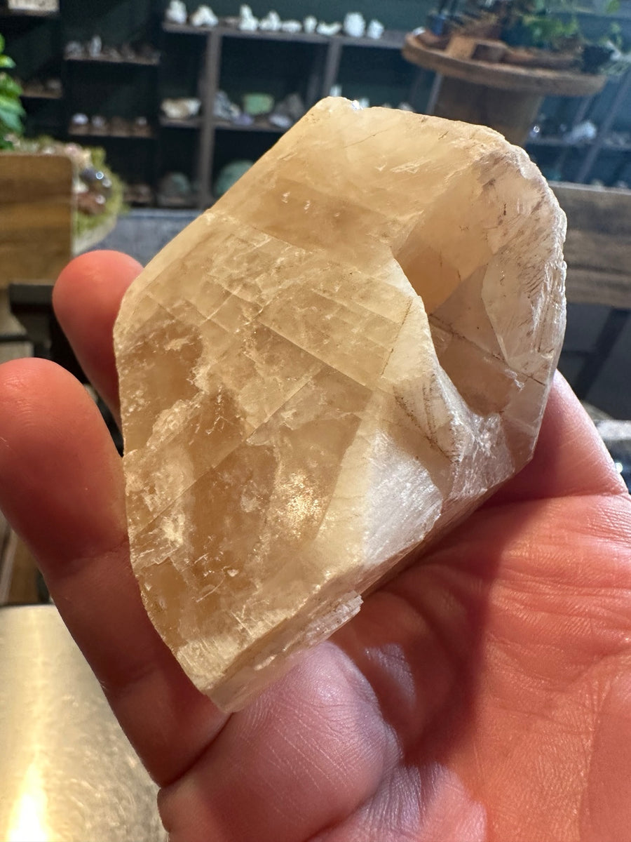 Honey calcite cleavage specimen, main crystal face