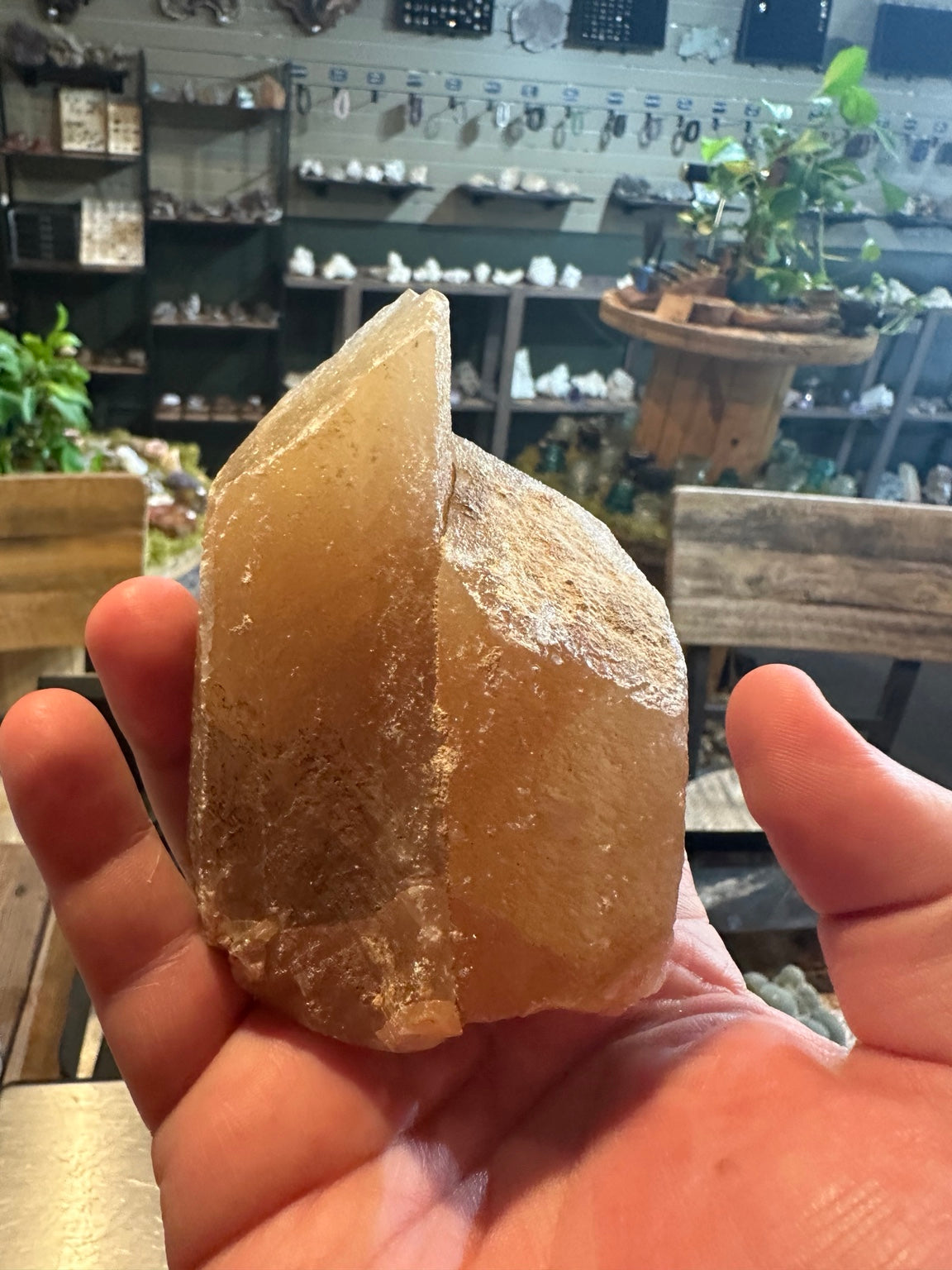 Fluorescent honey calcite specimen from Utah, crystal face detail