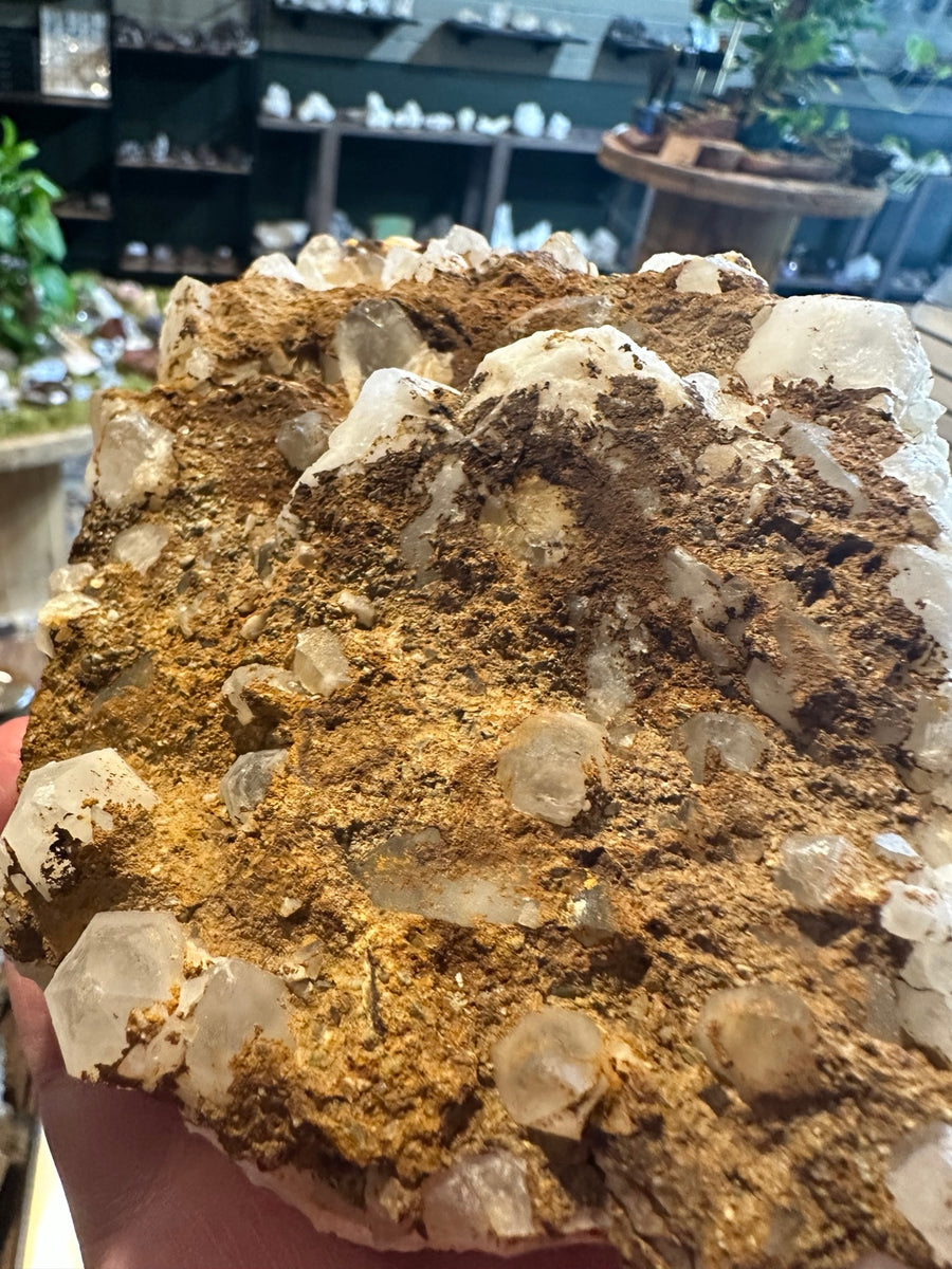 Calcite crystal cluster on iron-stained matrix from the Comstock Lode, Nevada, 30.5 oz — view 1