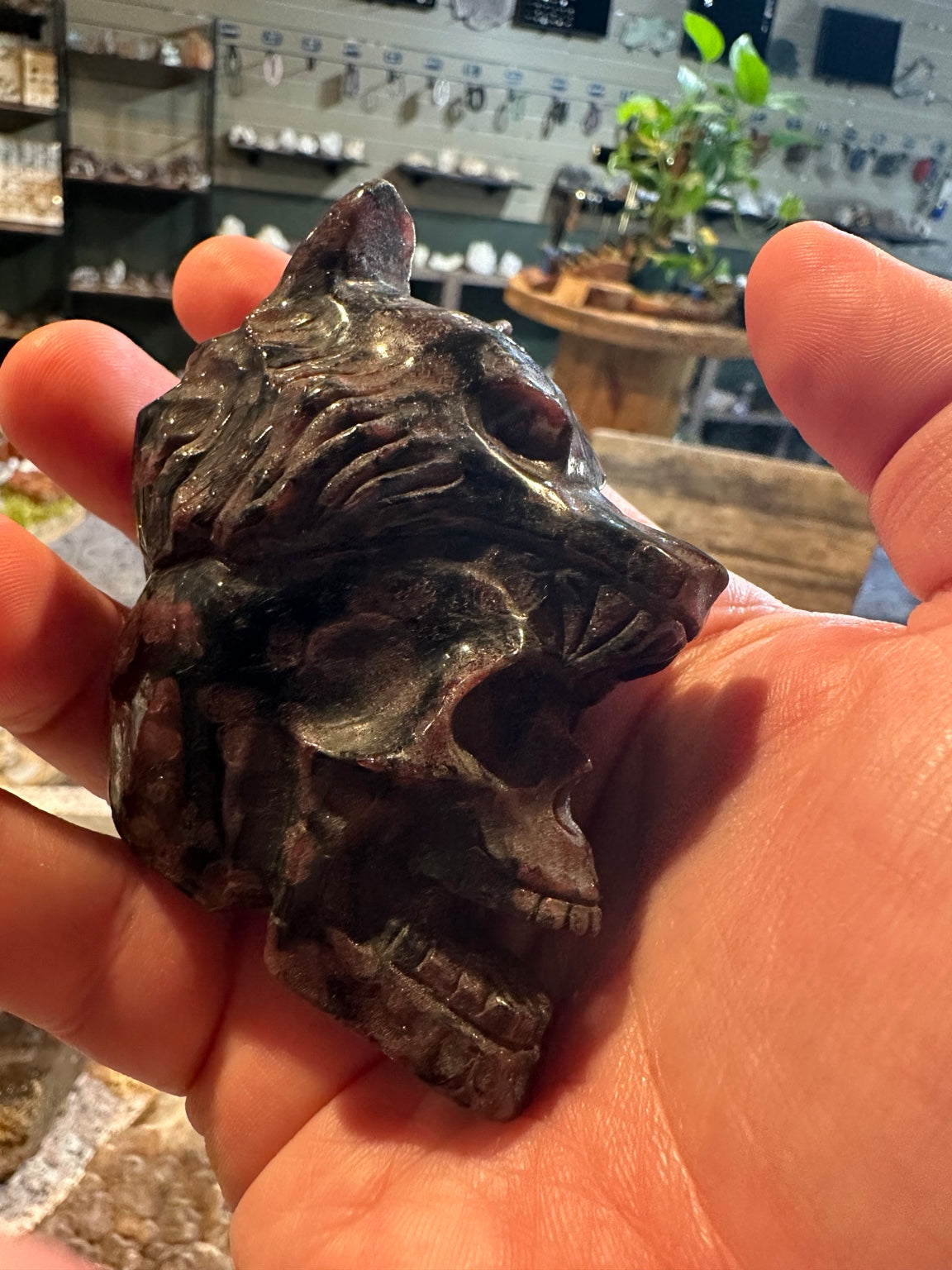 Natural garnet bear skull carving – view 1