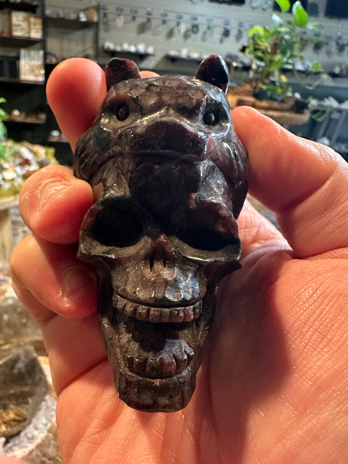 Natural garnet bear skull carving – view 2