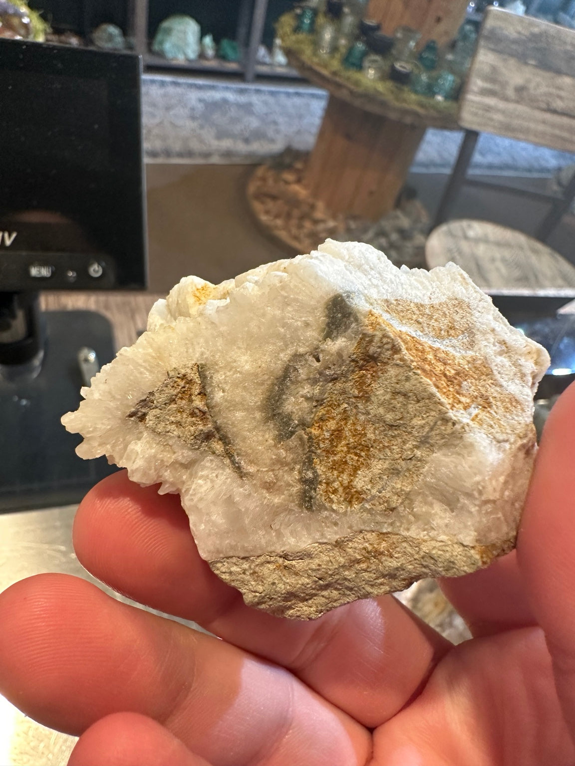 Alternate view of frosted druzy quartz and calcite crystal display