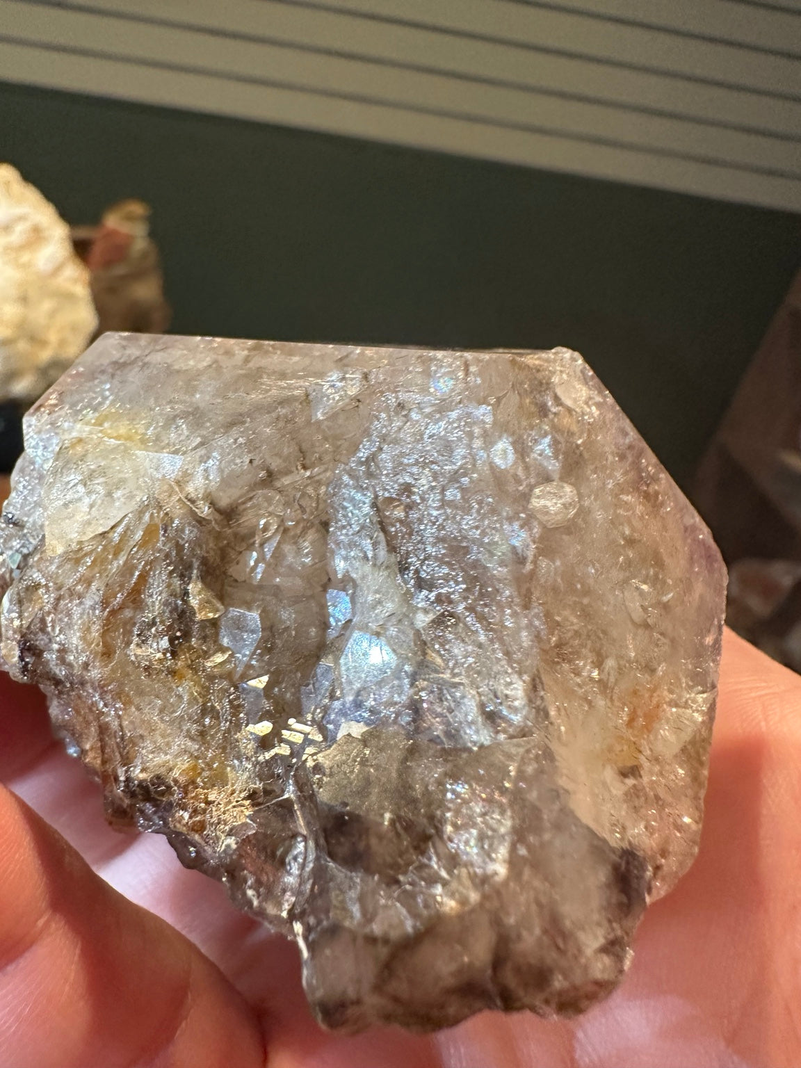 Western USA smoky quartz specimen side view showing internal veils and intricate growth