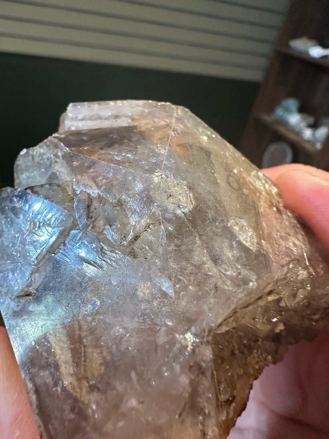 Close-up of translucent natural quartz crystal growth and internal veils