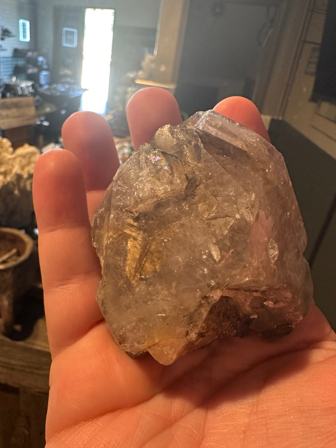Close detail of pale smoky quartz intergrowth and healed-style crystal faces