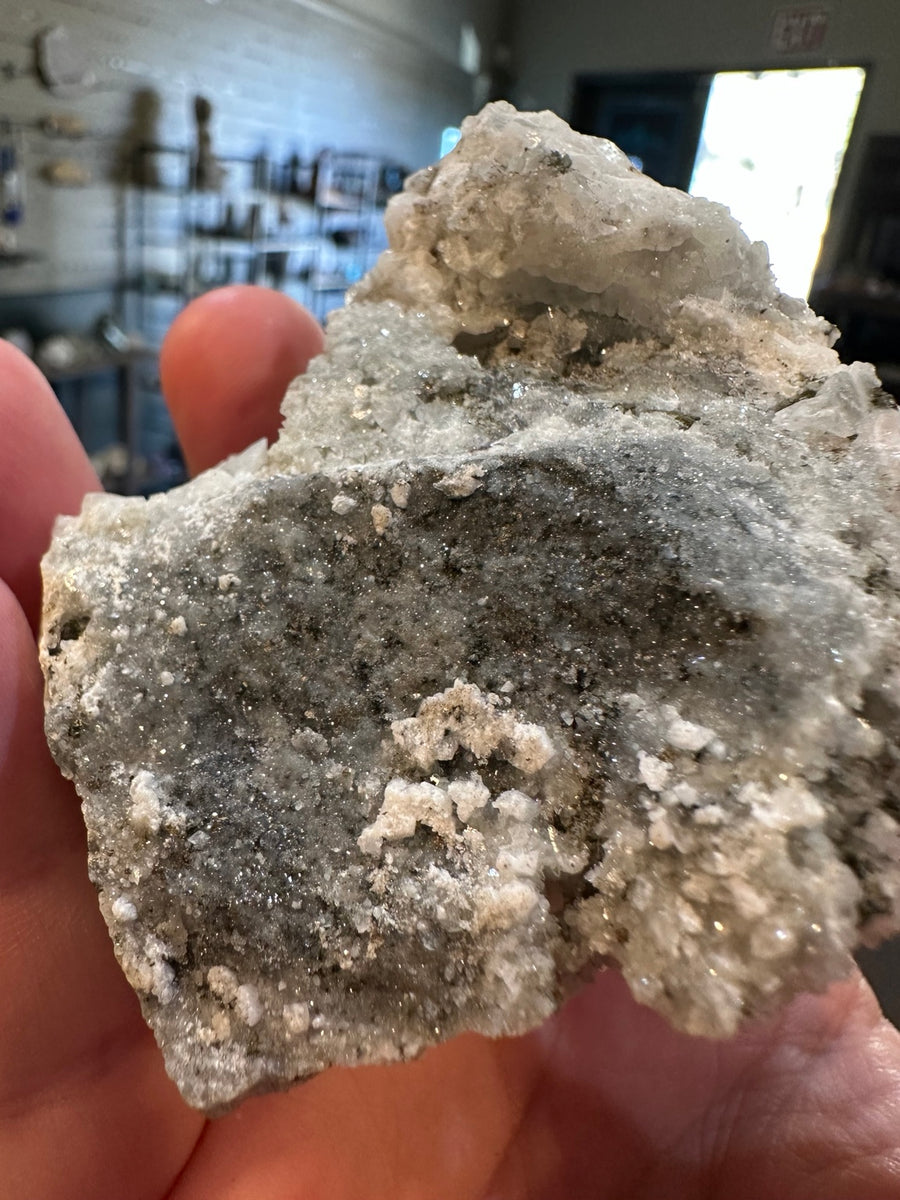 Nevada quartz calcite cluster 6.1 oz dark matrix back view