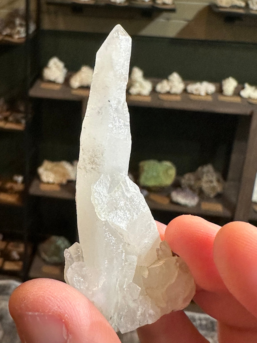 Brazil elongated quartz crystal with metallic hematite inclusions, 0.9 oz