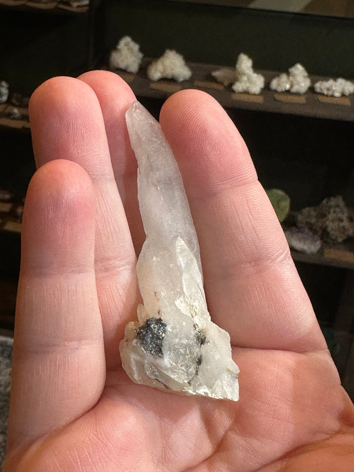 Brazil quartz crystal in hand, 0.9 oz