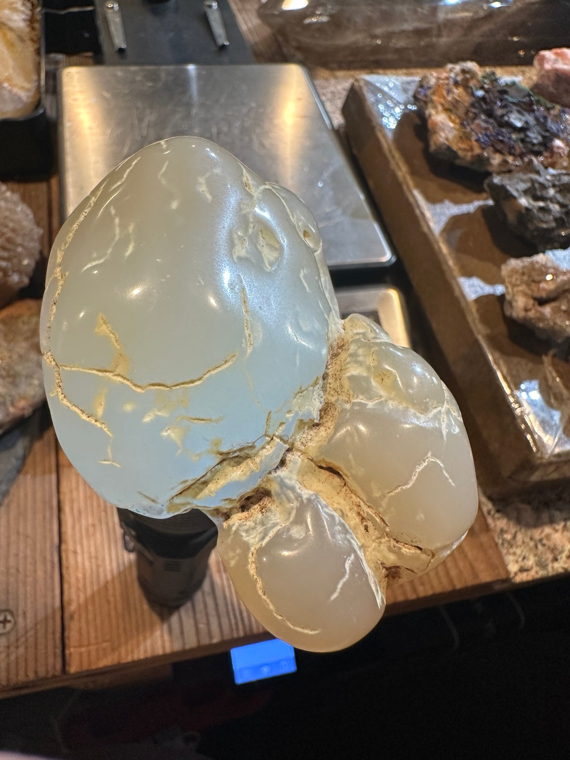 Nevada polished botryoidal chalcedony 2.3 ounces, blue fluorescent appearance under approximately 395 nm UV