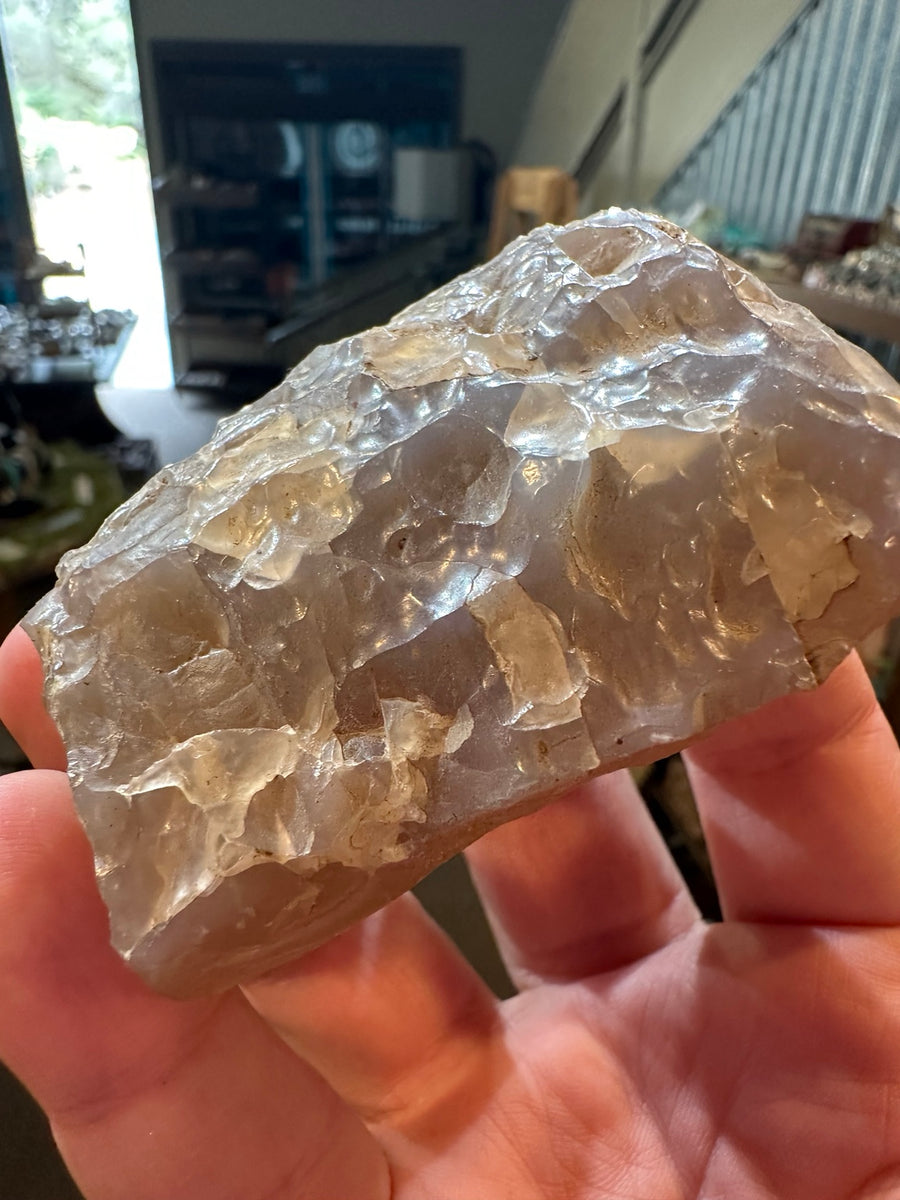 Natural African lavender chalcedony rough 5.6 ounces showing translucent pale purple silica, view 1