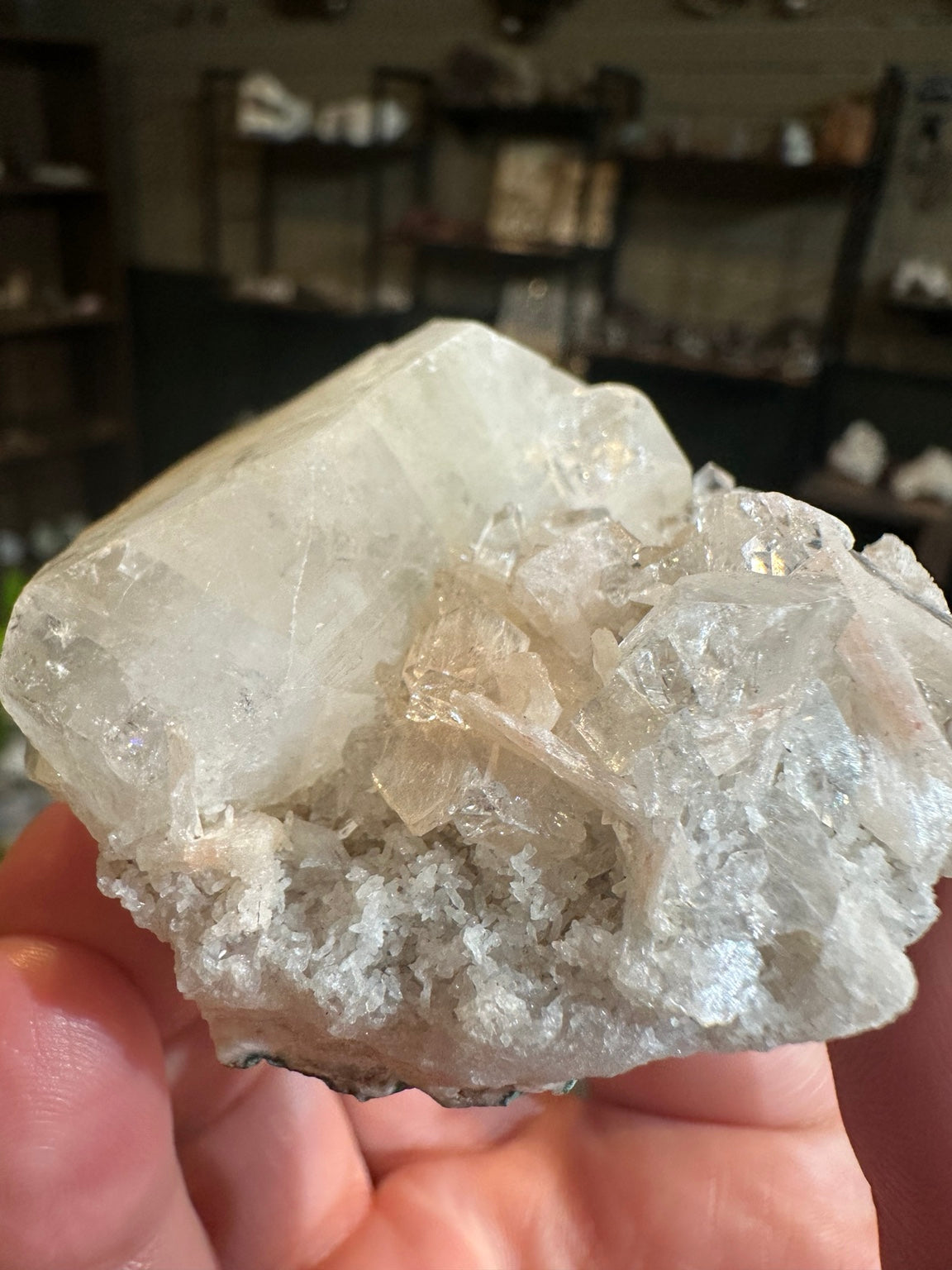 Arkansas quartz crystal cluster with blue-green mineralization — view 3