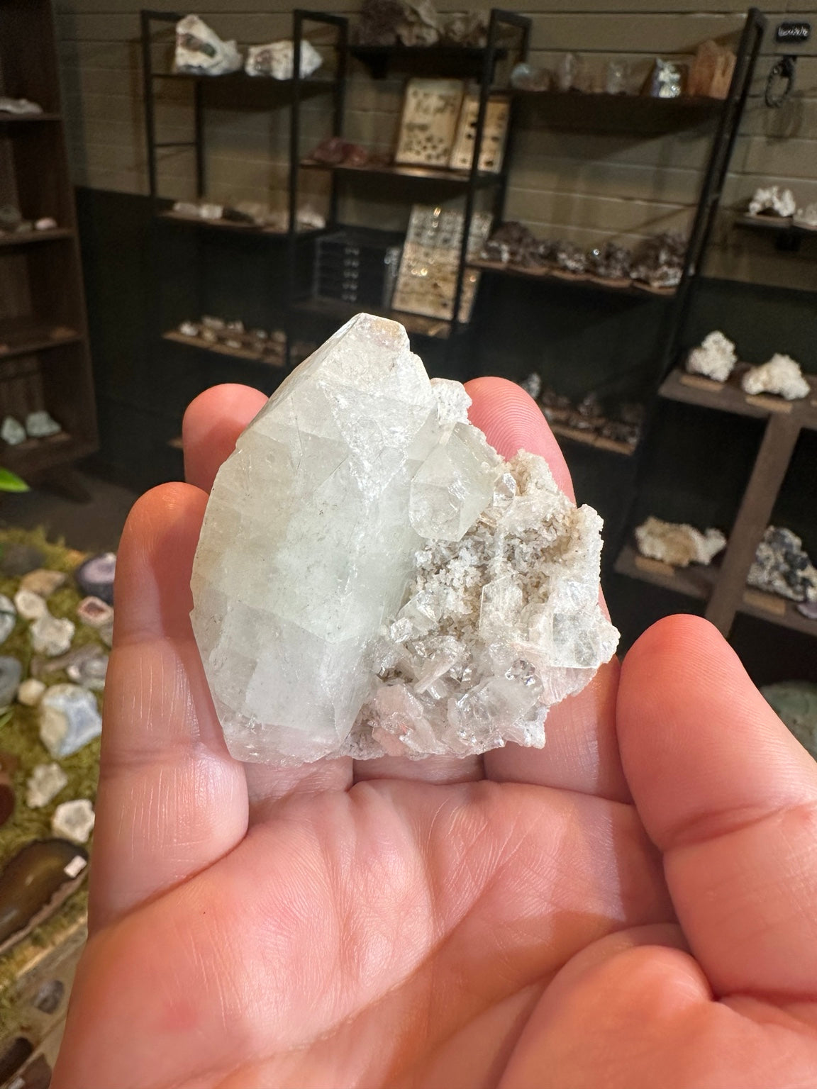 Arkansas quartz crystal cluster with blue-green mineralization — view 5