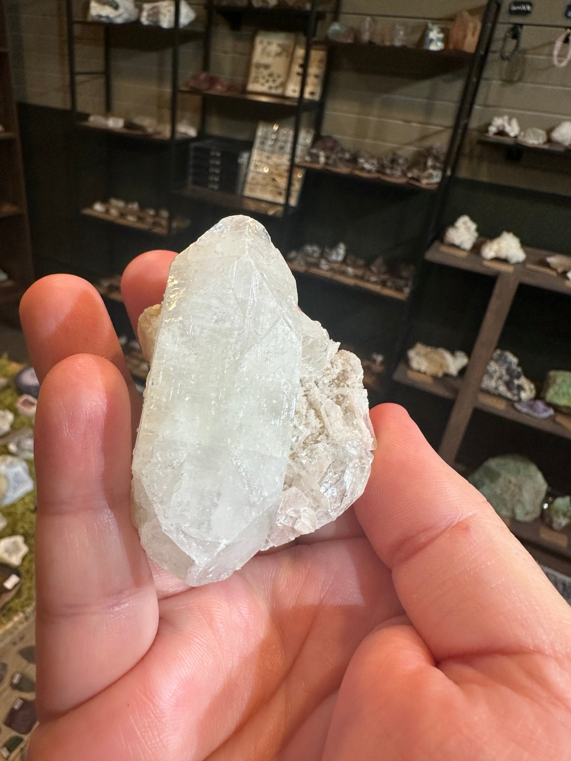 Arkansas quartz crystal cluster with blue-green mineralization — view 6