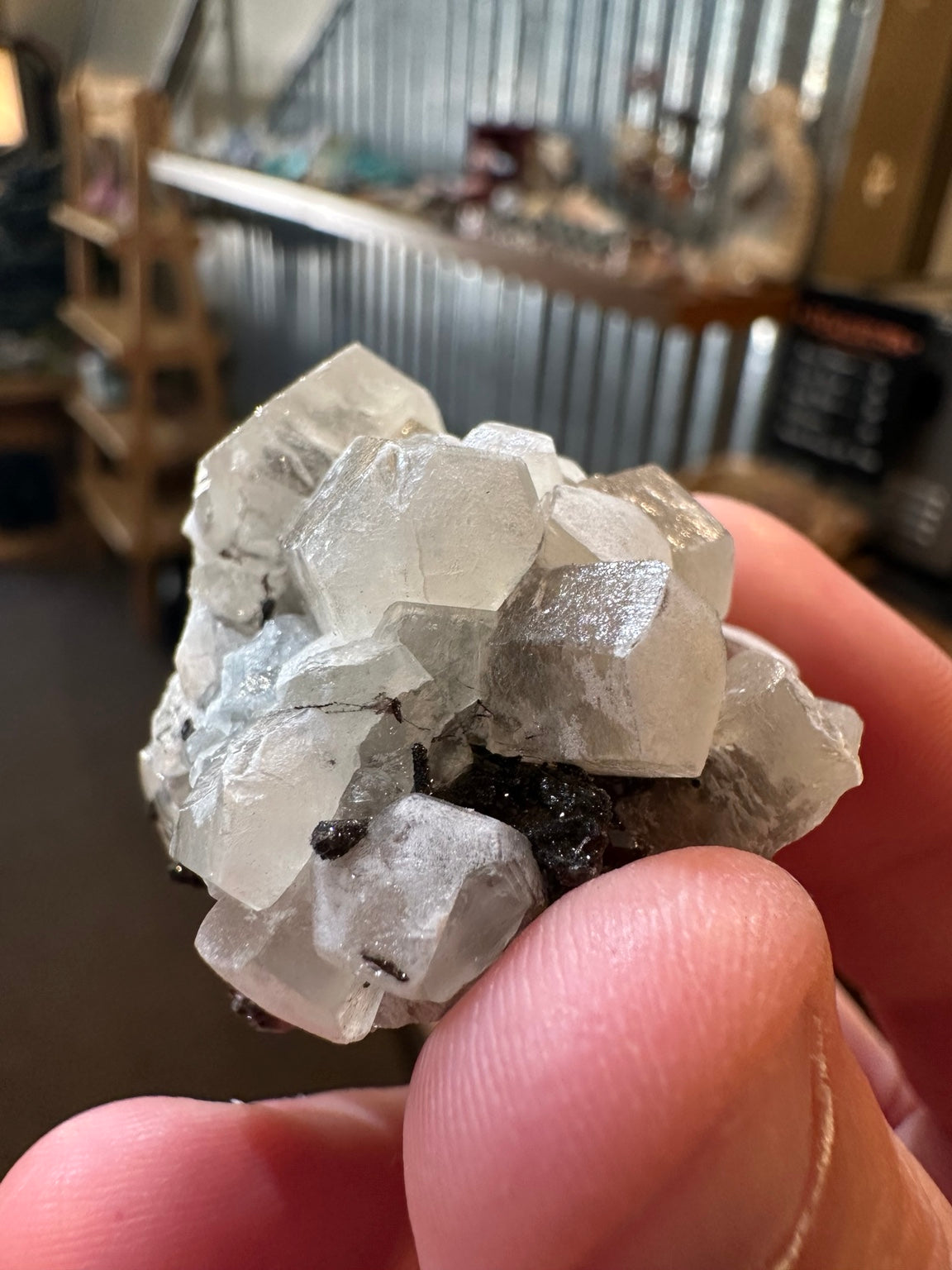 White barite crystal cluster on dark iron-oxide-rich matrix from the Western U.S. — view 1