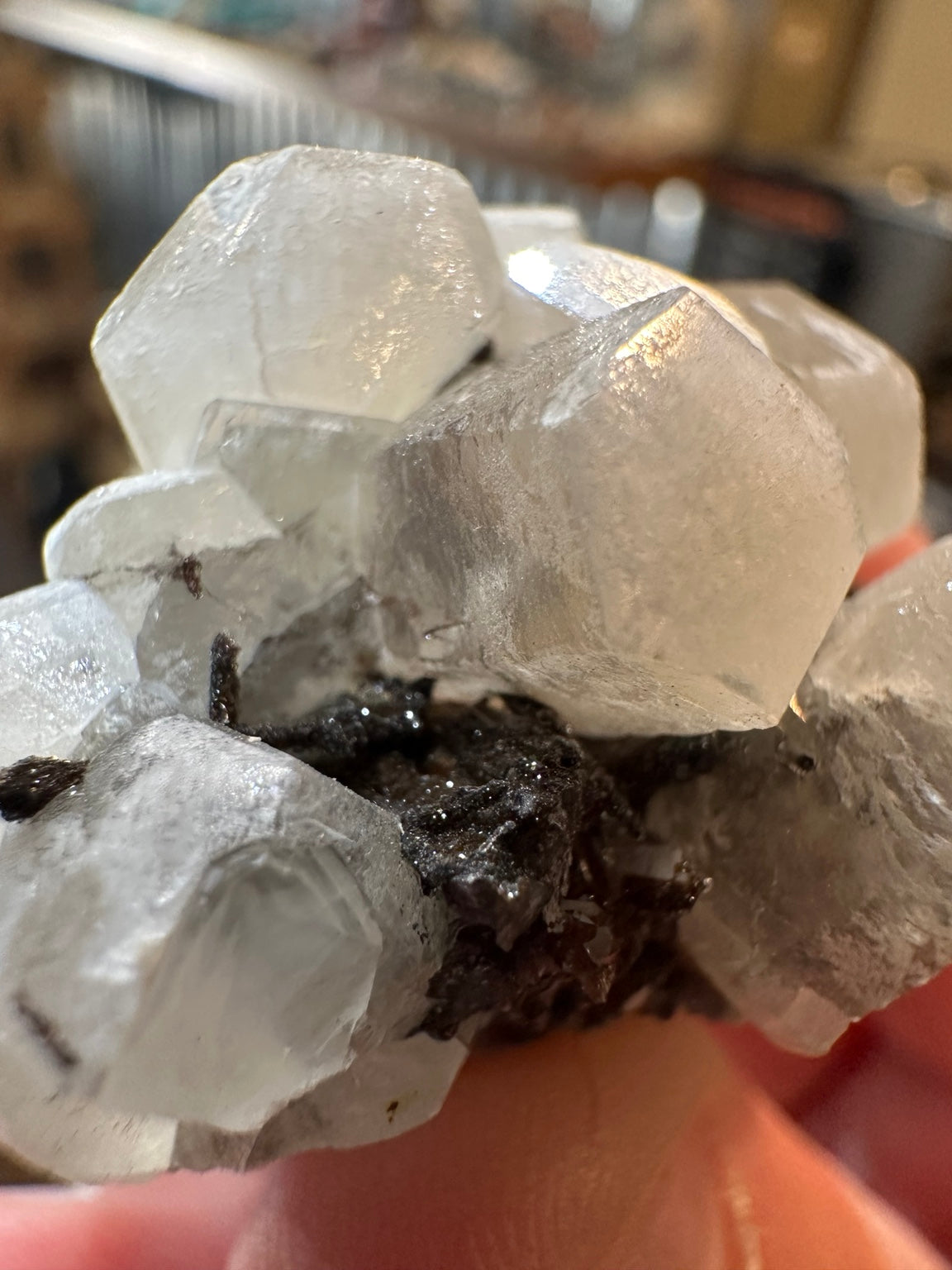 White barite crystal cluster on dark iron-oxide-rich matrix from the Western U.S. — view 2