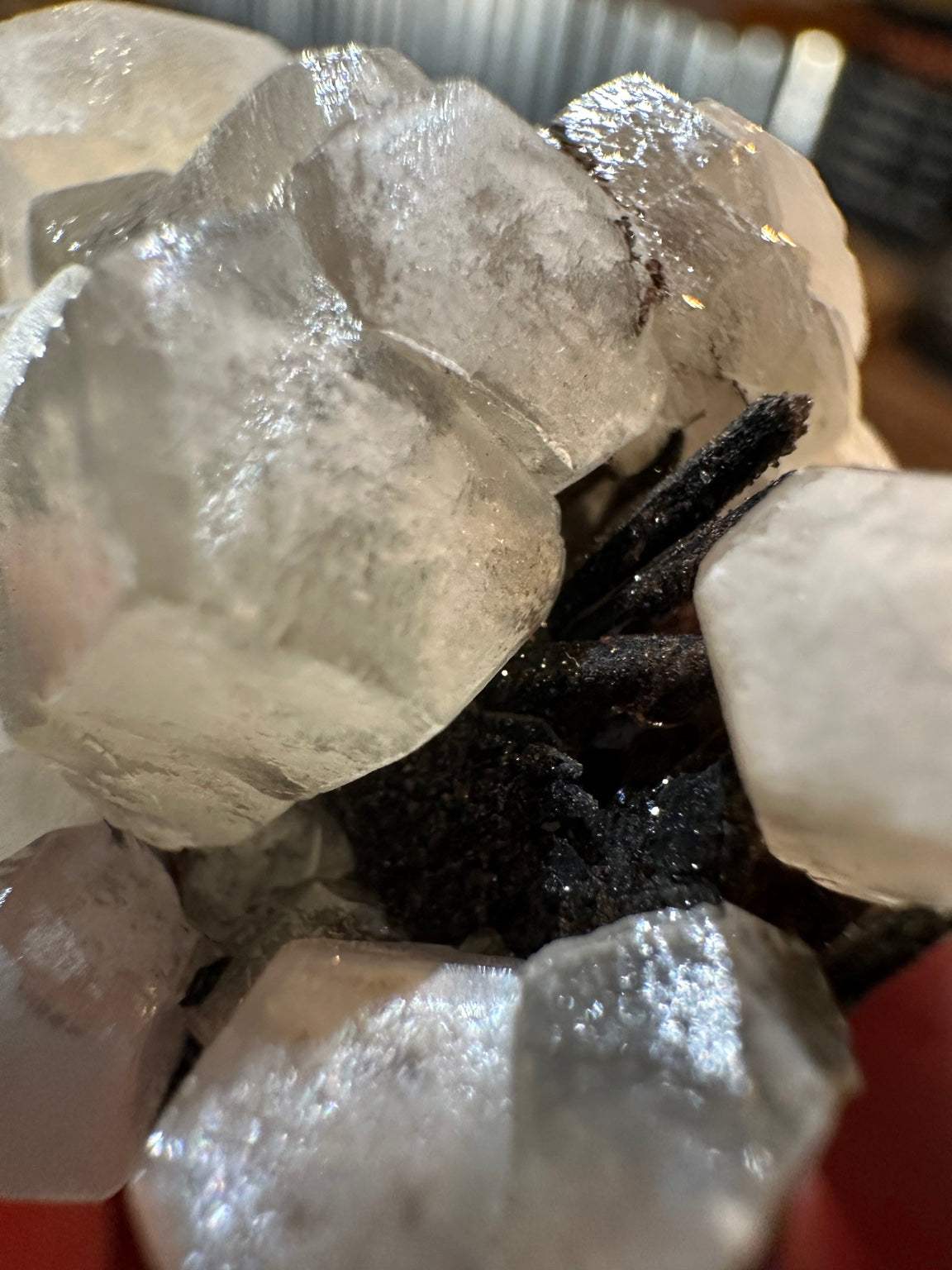 White barite crystal cluster on dark iron-oxide-rich matrix from the Western U.S. — view 6