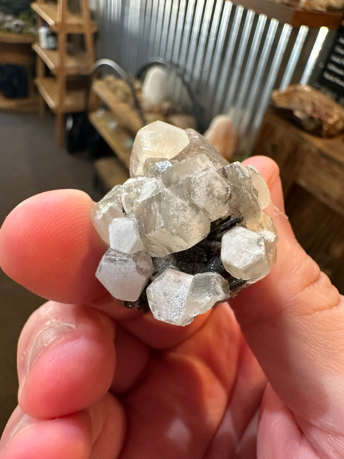 White barite crystal cluster on dark iron-oxide-rich matrix from the Western U.S. — view 7