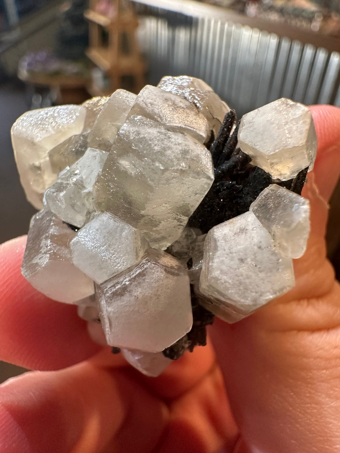 White barite crystal cluster on dark iron-oxide-rich matrix from the Western U.S. — view 8