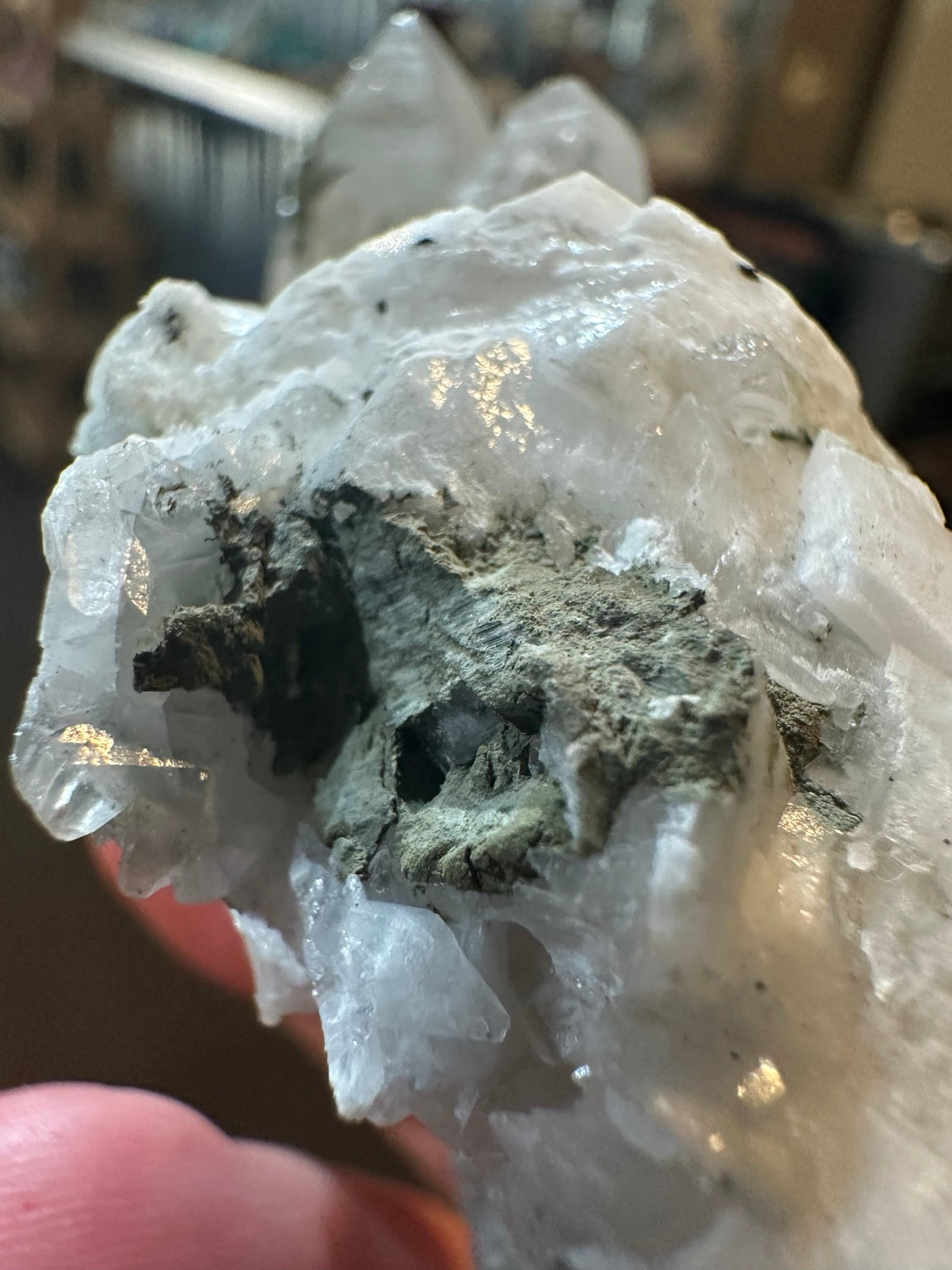Brazilian quartz crystal cluster with white bladed crystal growth and green mineralization — view 5