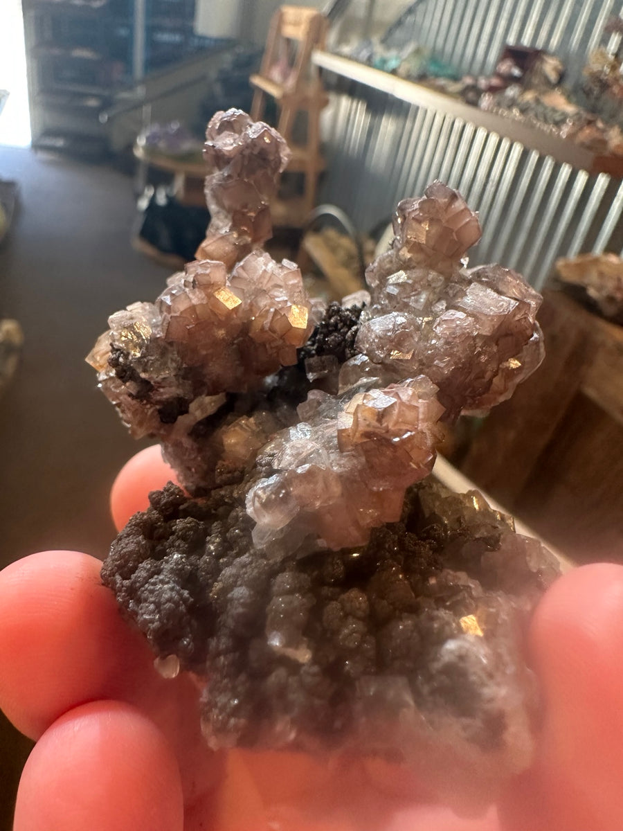 Calcite on botryoidal goethite mineral specimen from Mexico, front view