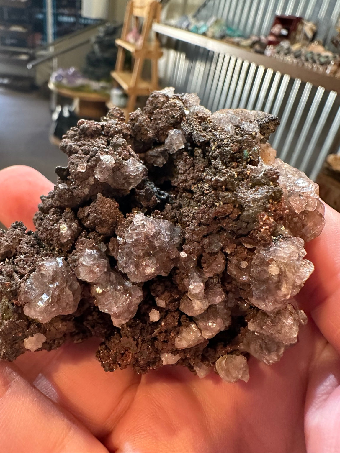 Calcite crystals and dark goethite botryoids, macro detail