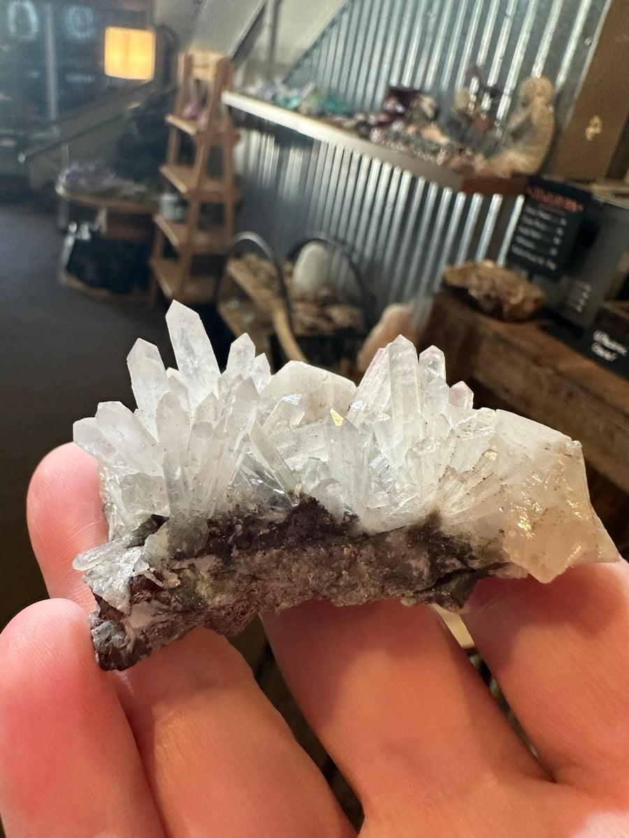 Clear quartz crystal cluster on natural matrix from Colorado