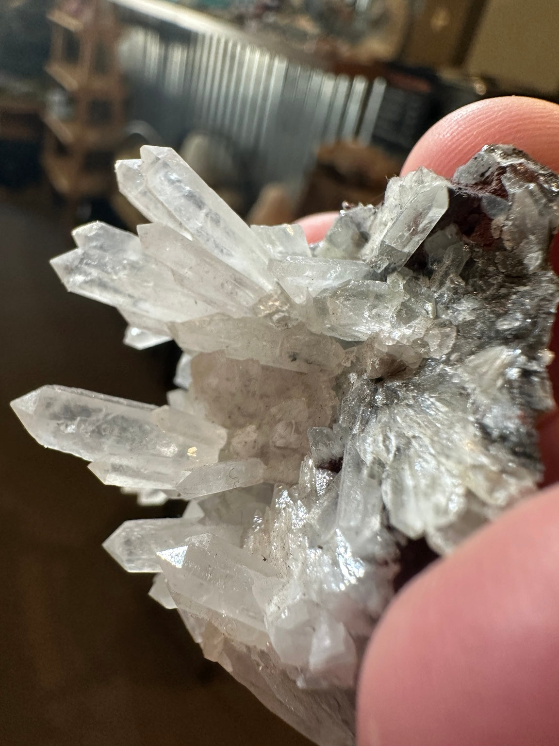 Close view of clear terminated quartz points on Colorado matrix