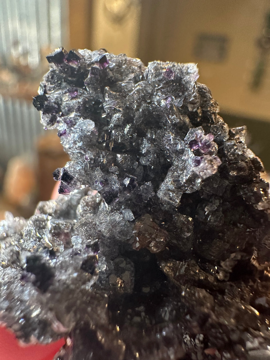 Rare dark violet cubic fluorite on goethite from Nevada — view 3