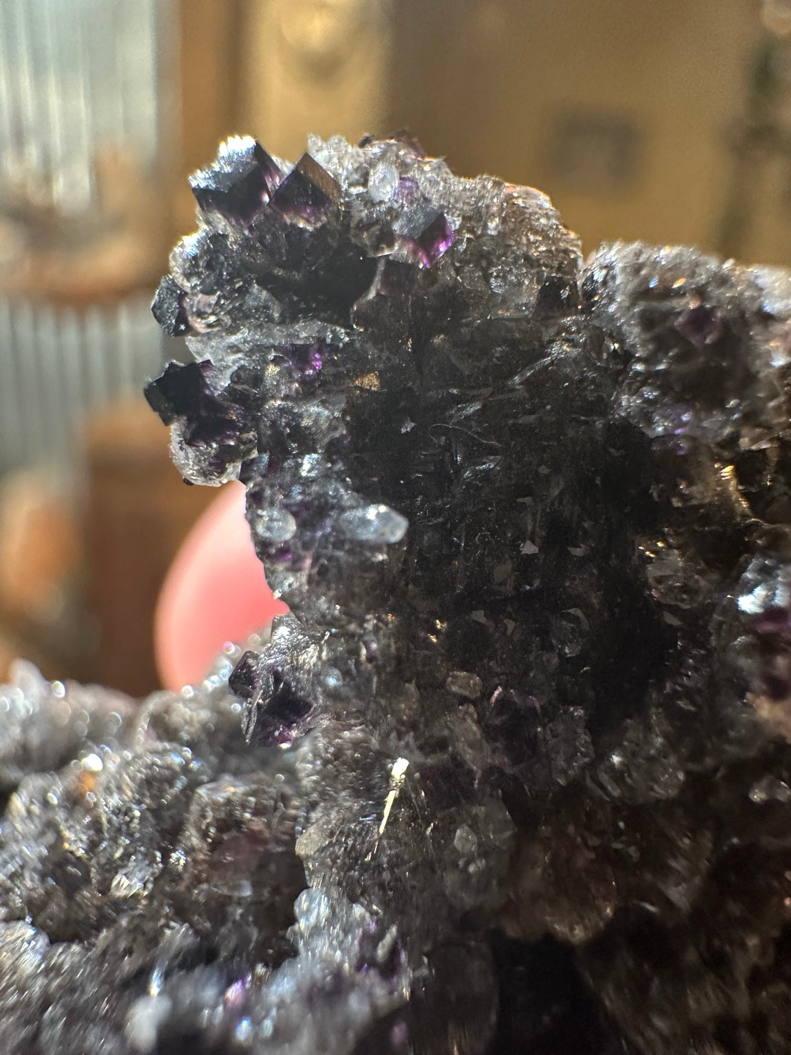 Rare dark violet cubic fluorite on goethite from Nevada — view 4