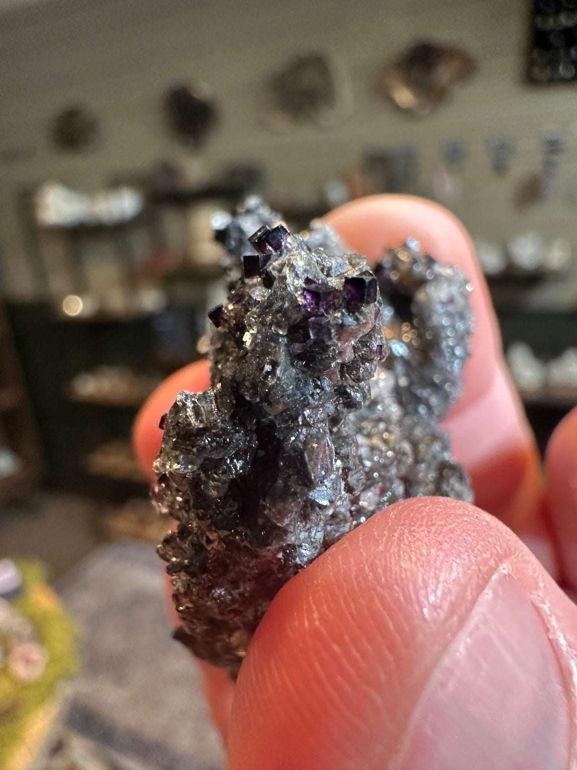 Rare dark violet cubic fluorite on goethite from Nevada — view 6