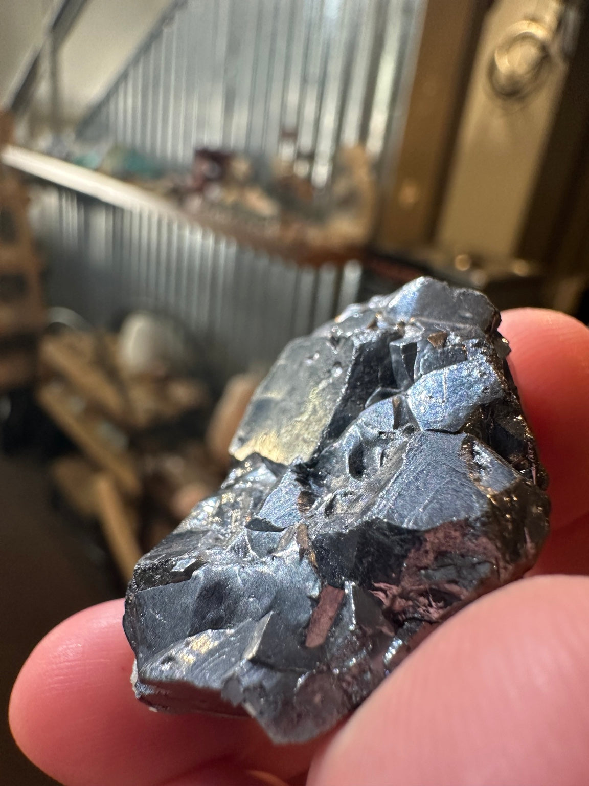 Metallic hematite crystal cluster with quartz from Nevada — view 3