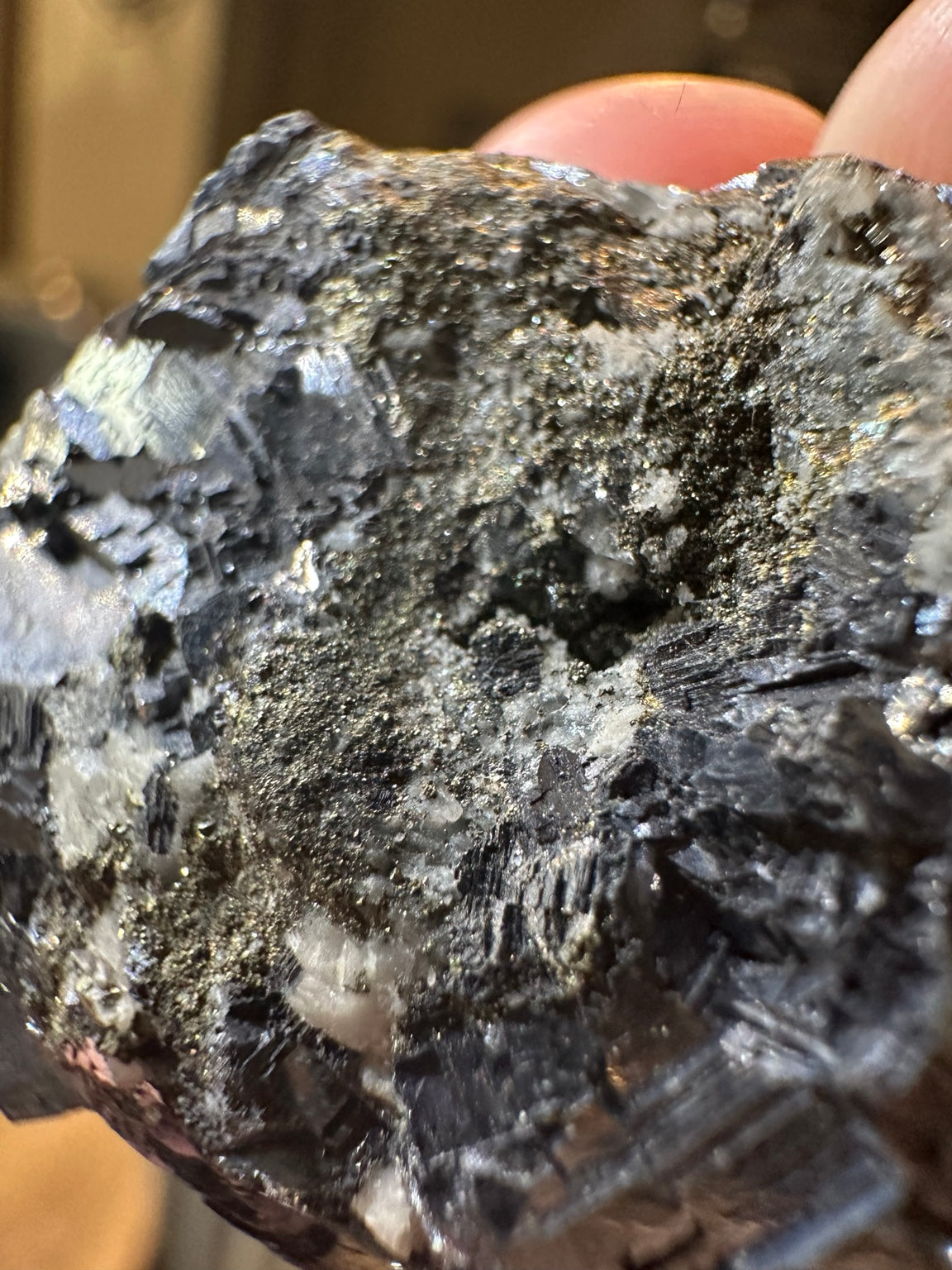 Metallic hematite crystal cluster with quartz from Nevada — view 5