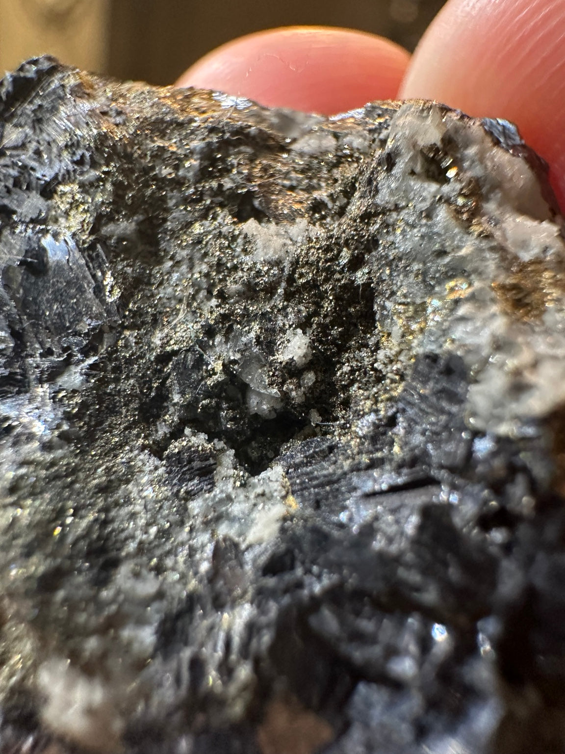 Metallic hematite crystal cluster with quartz from Nevada — view 6