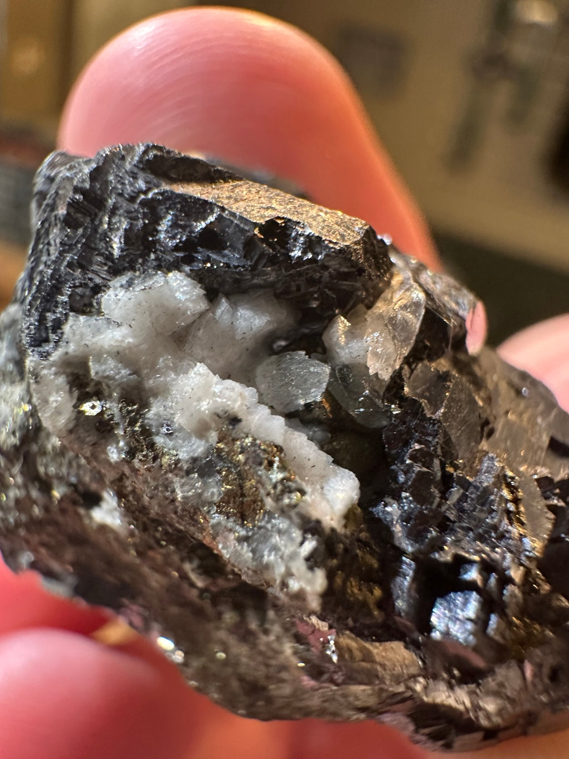 Metallic hematite crystal cluster with quartz from Nevada — view 7