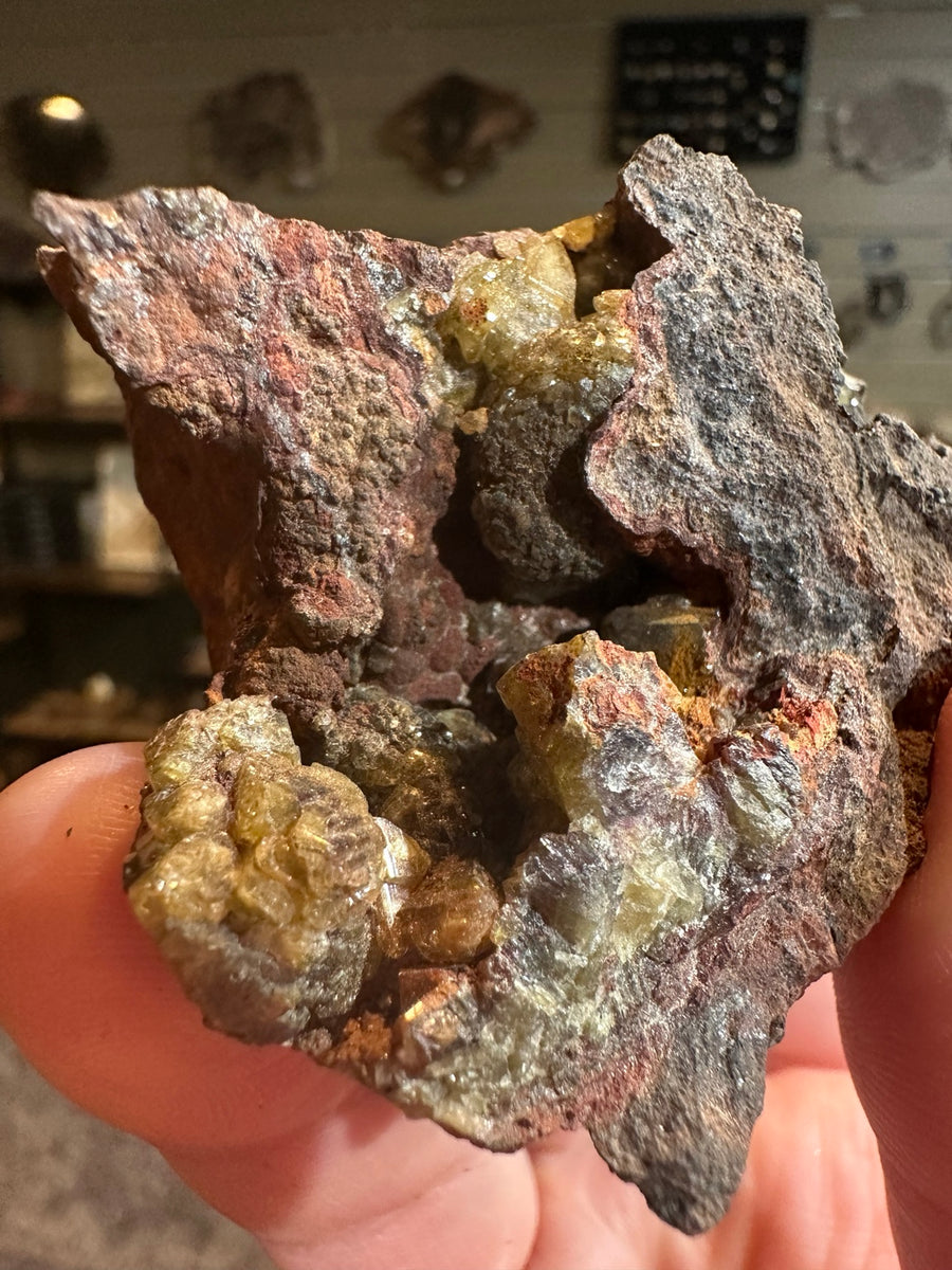 Olive-yellow vesuvianite candidate in rust colored matrix, Mexico Lake Jaco attributed, photo 1