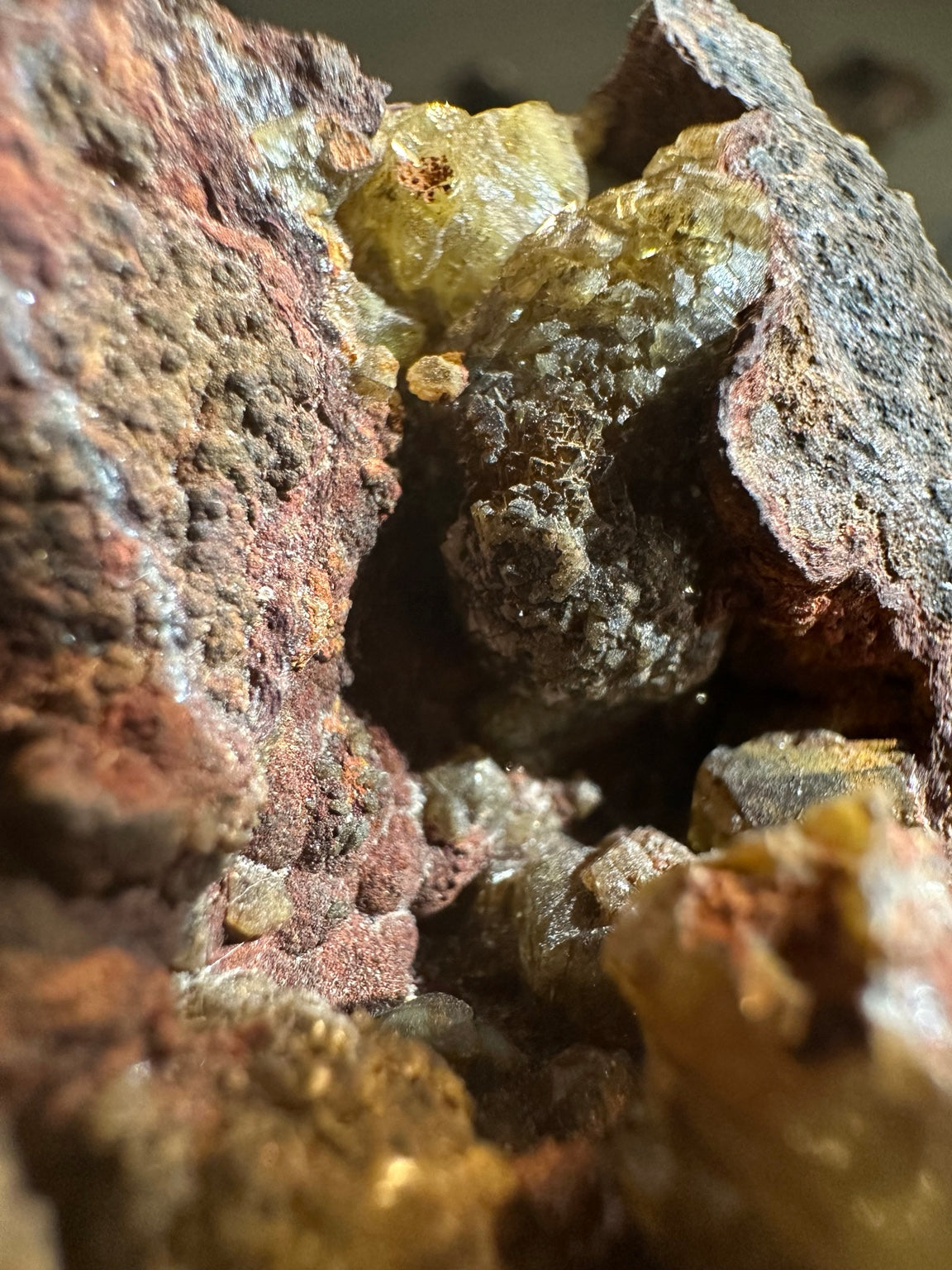 Olive-yellow vesuvianite candidate in rust colored matrix, Mexico Lake Jaco attributed, photo 4