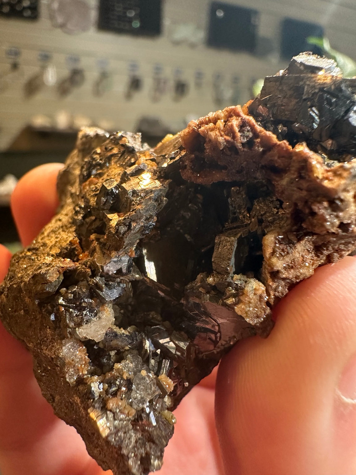 Reported Nevada 6.1 oz mixed sulfide specimen with dark lustrous crystals and rust orange mineral growth; image 6