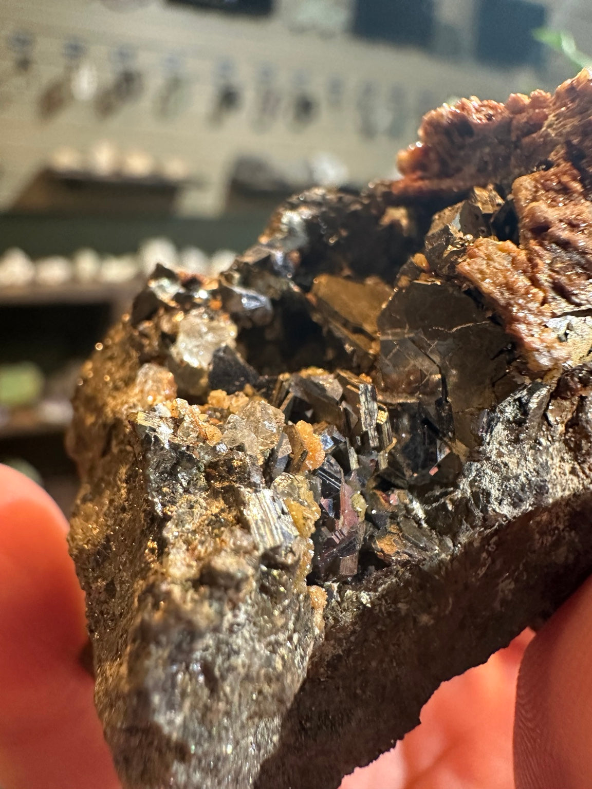 Reported Nevada 6.1 oz mixed sulfide specimen with dark lustrous crystals and rust orange mineral growth; image 7