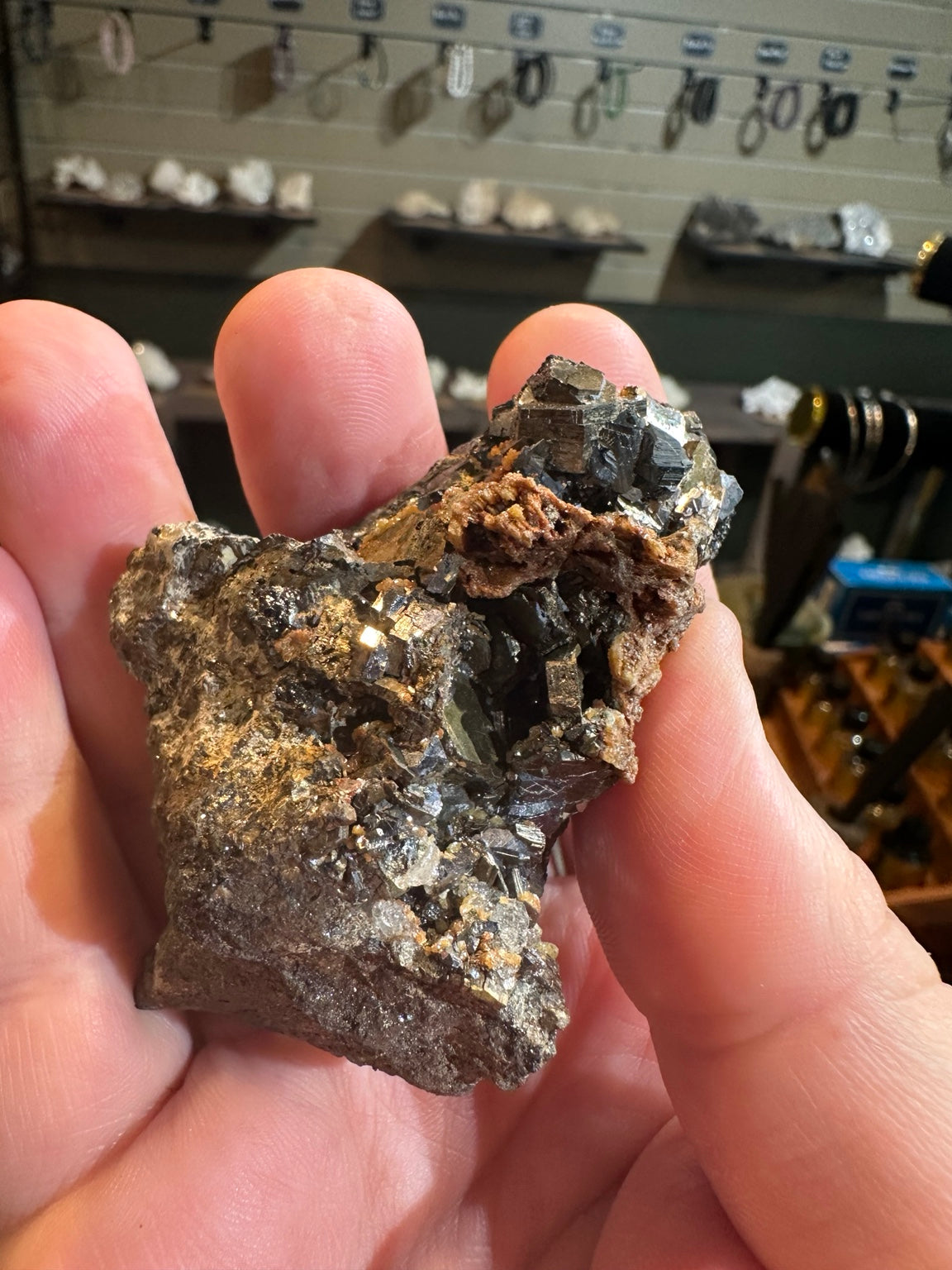 Reported Nevada 6.1 oz mixed sulfide specimen with dark lustrous crystals and rust orange mineral growth; image 8