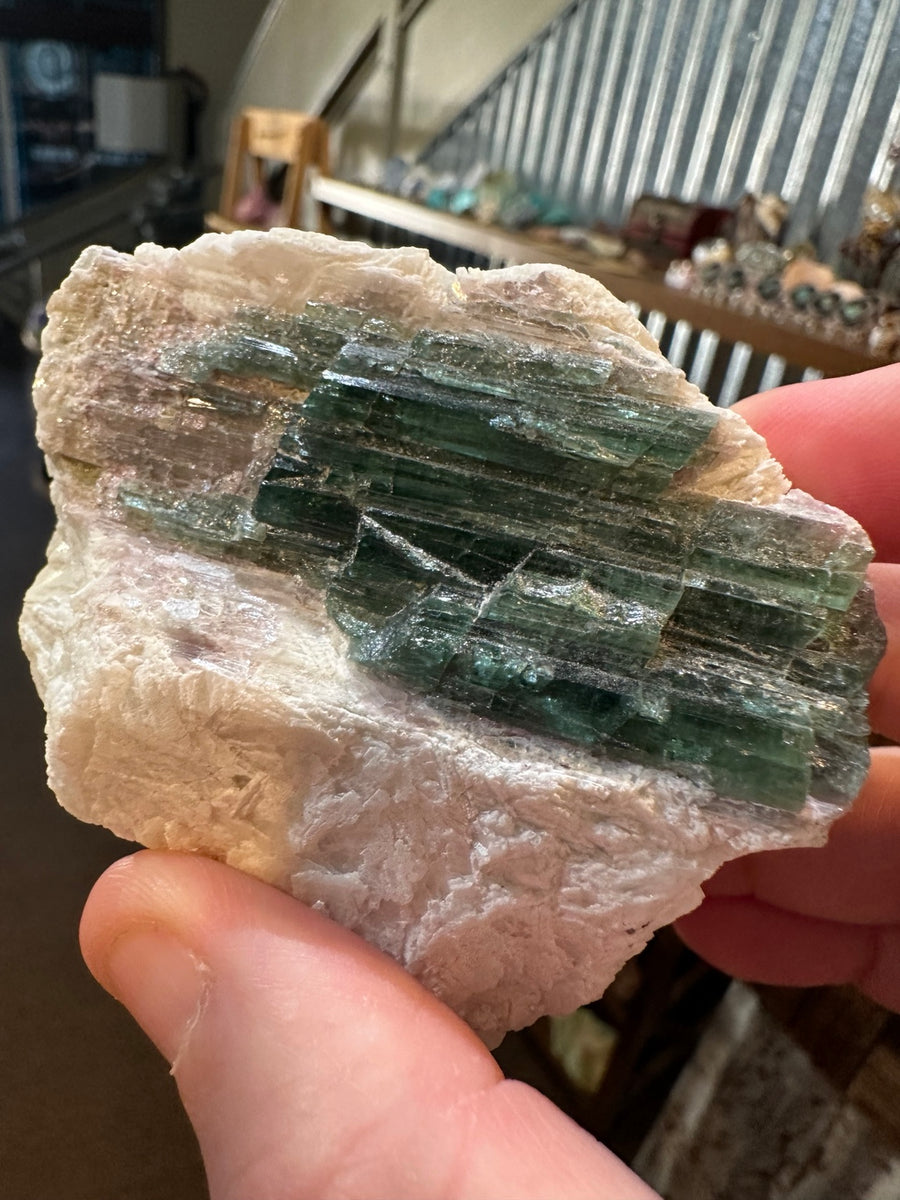 Green and pink elbaite tourmaline in pegmatite from the Pala District, San Diego County, California, front view