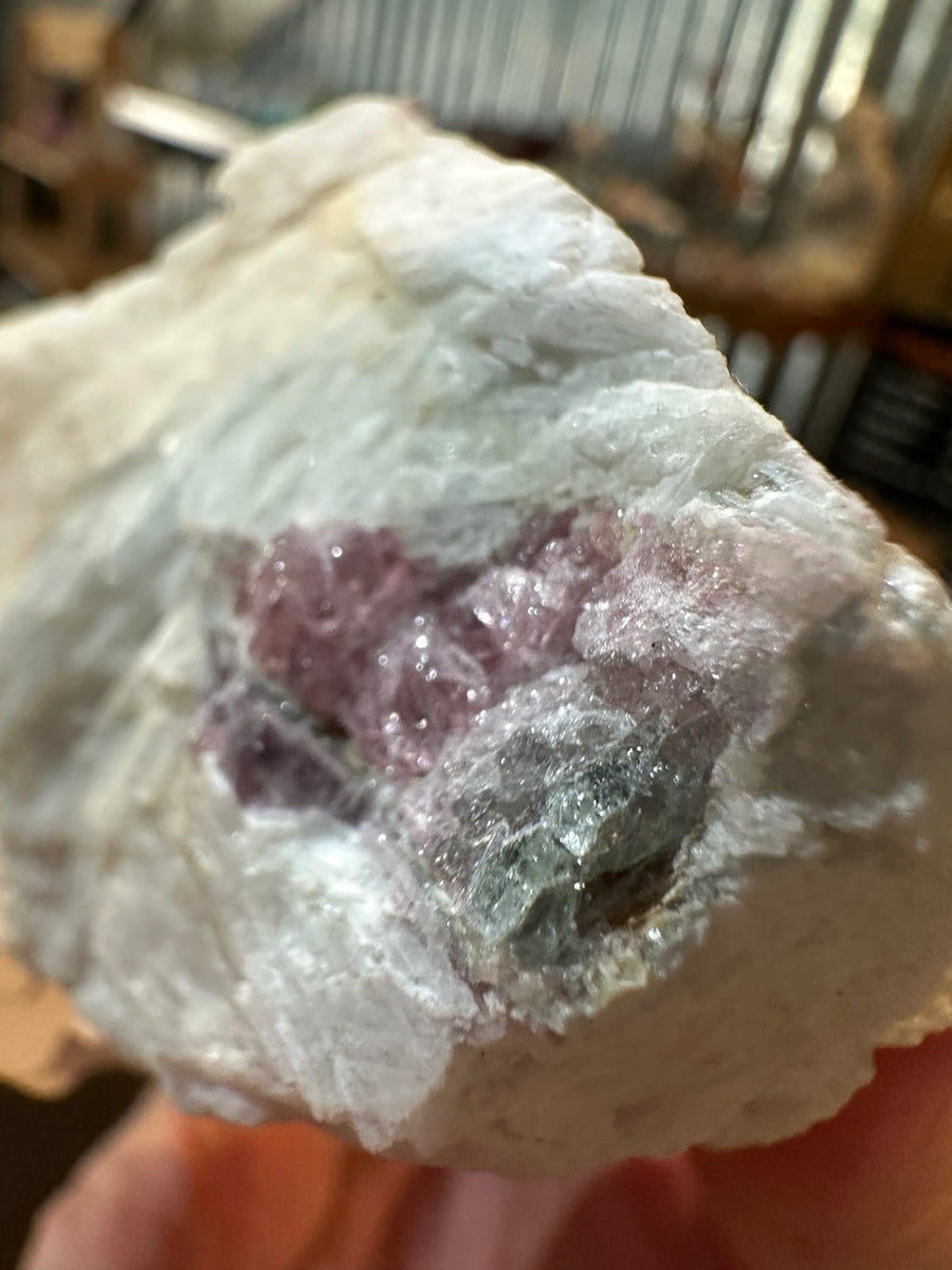 Green and pink elbaite tourmaline in pegmatite from the Pala District, California, front view
